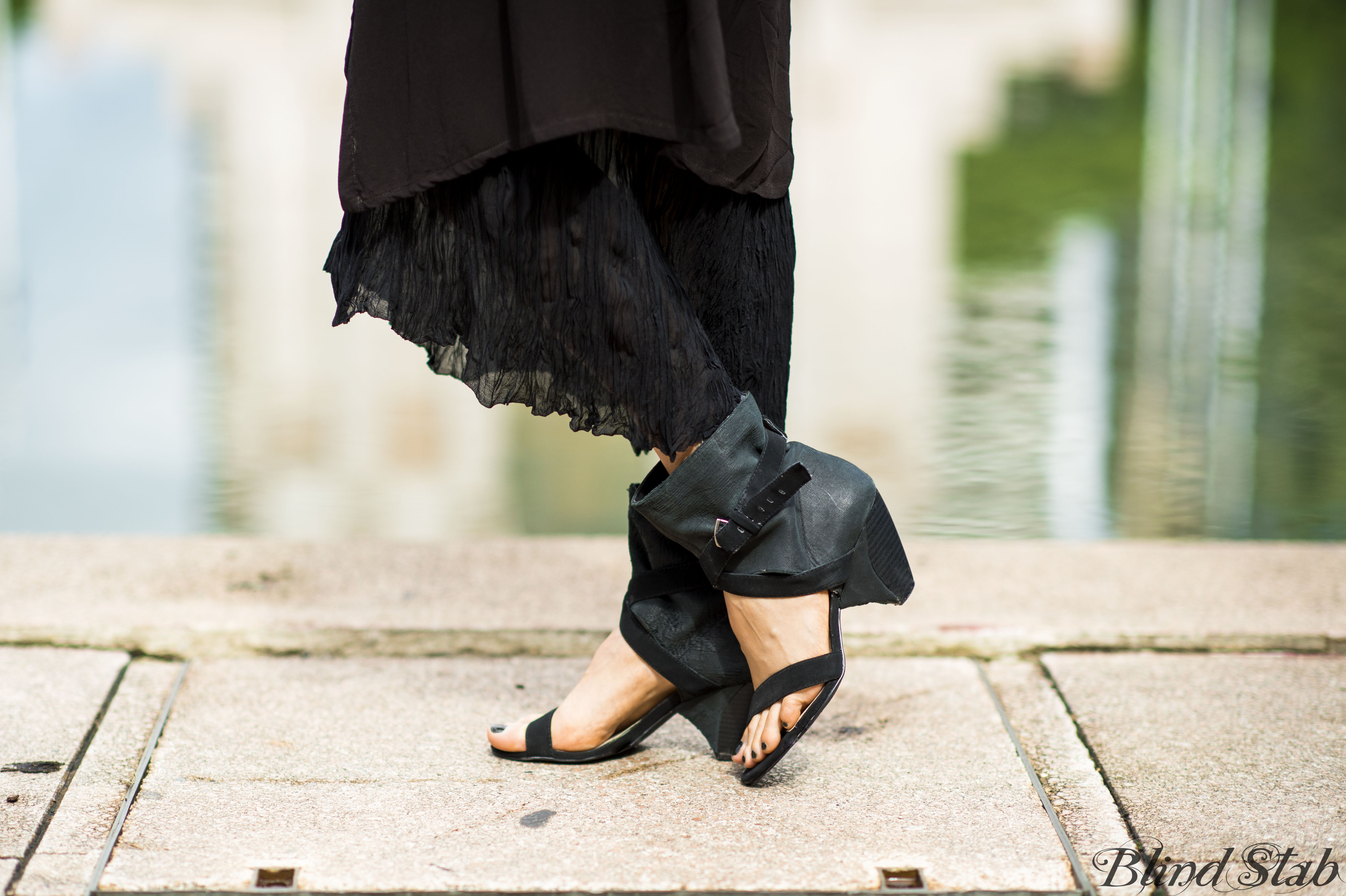 Girl-Jumping-Streetstyle-Goth-Black-Dress-Long-Hair