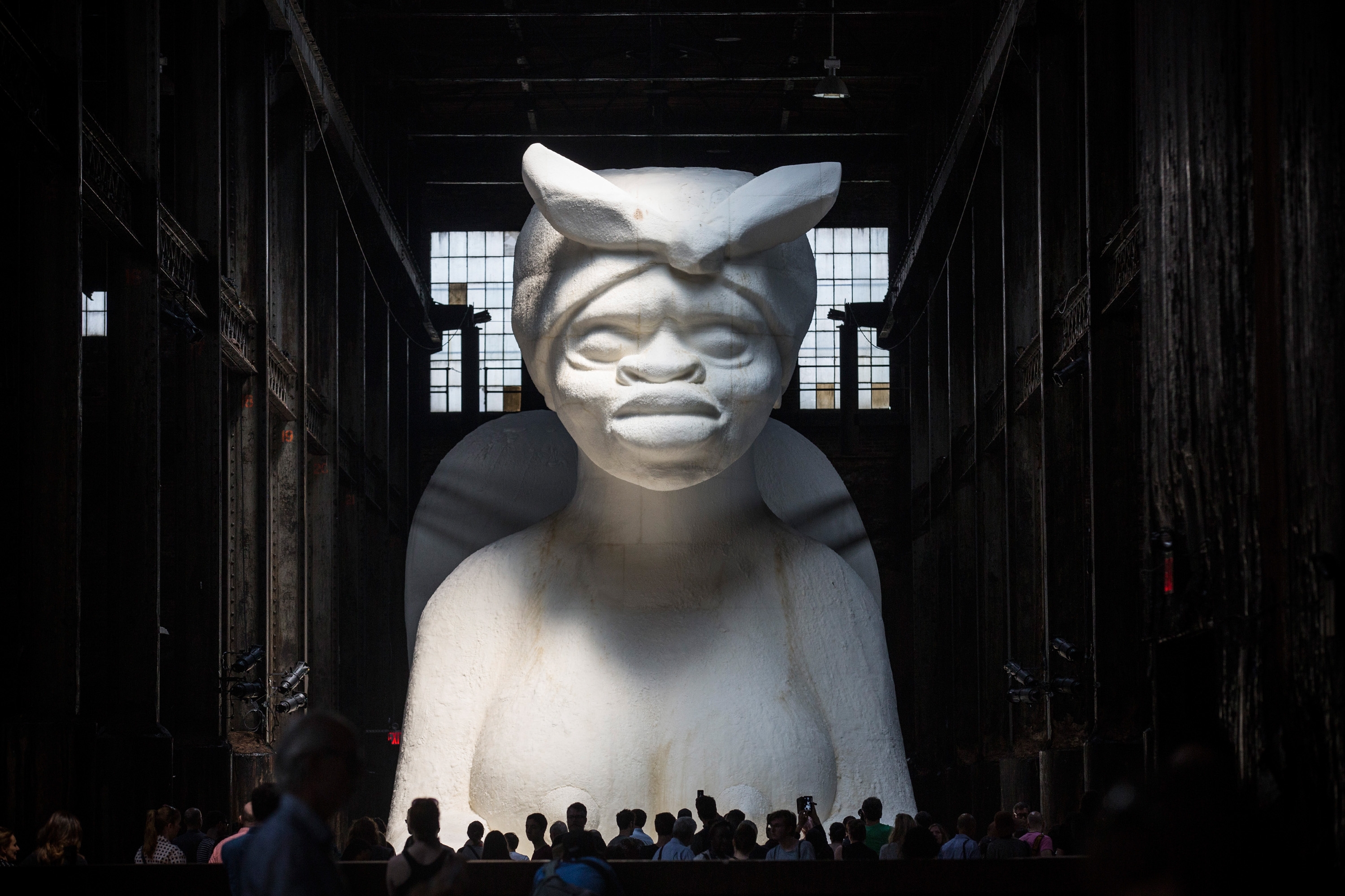 Large Scale Sugar-Coated Sculpture Displayed In Brooklyn's Former Domino Sugar Refinery