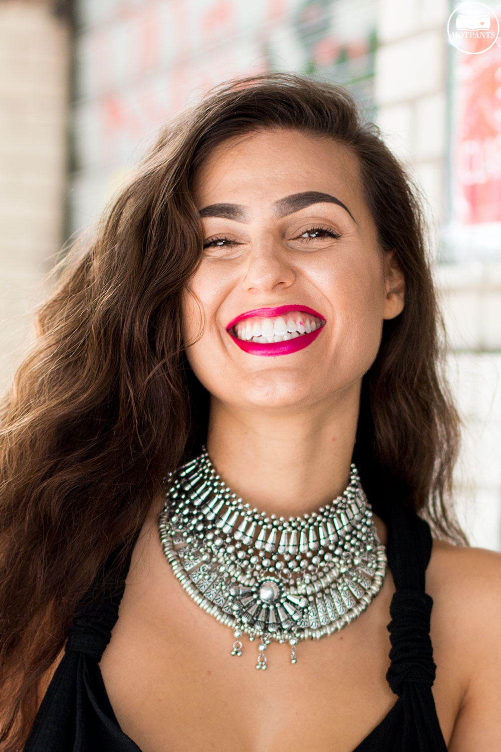 Girl with lipstick on her teeth 